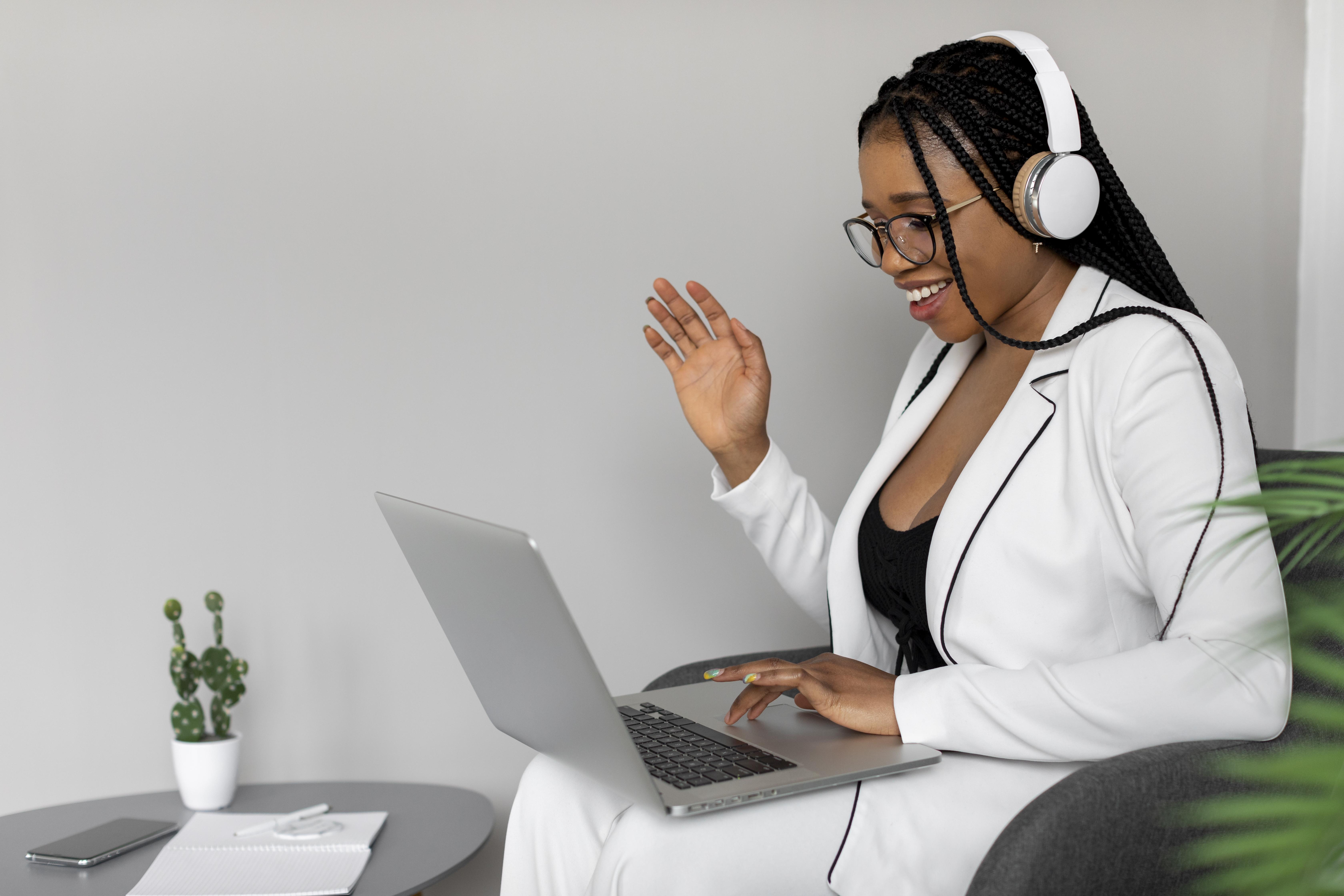medium-shot-woman-holding-laptop